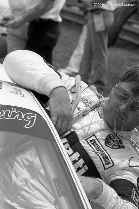 Bruce Jenner strapping in to the #42 Porsche