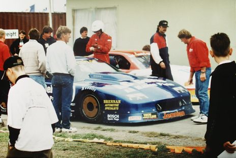 The Camaro being worked on in the paddock