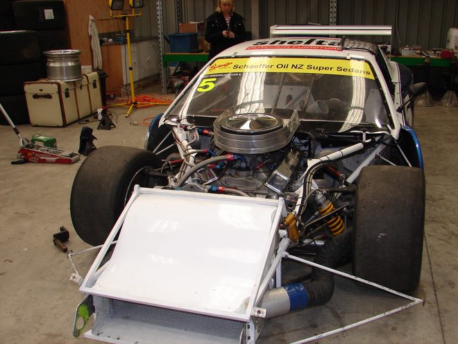 Andy Greenslade's Camaro with the front bodywork off, showing the V8 and chassis