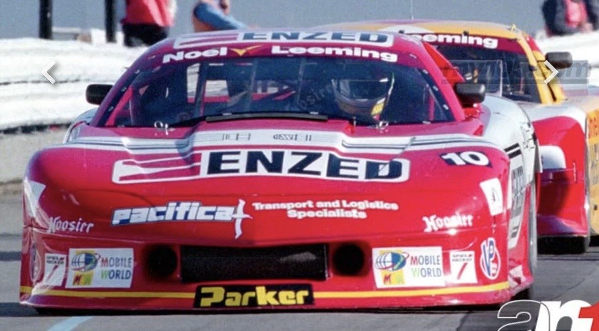 The RocketSports Camaro as #10 in red ENZED, Noel Leeming and Pacifica colours, a Noel Leeming car behind