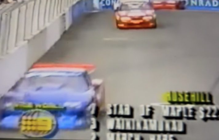 The blue Jenner Camaro on the Surfers Paradise street circuit, Channel 9 coverage