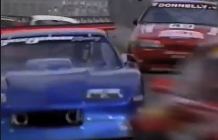 The blue Jenner Camaro ahead of a red Australian saloon at Surfers Paradise